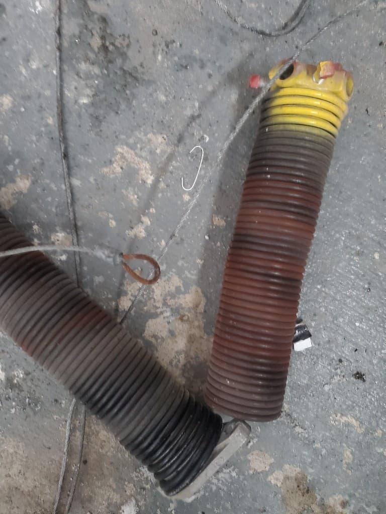 Broken garage door springs — spring replacement Ottawa